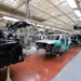 Assembly line factory production cars modern automotive industry car being checked before being painted hightech enterprise